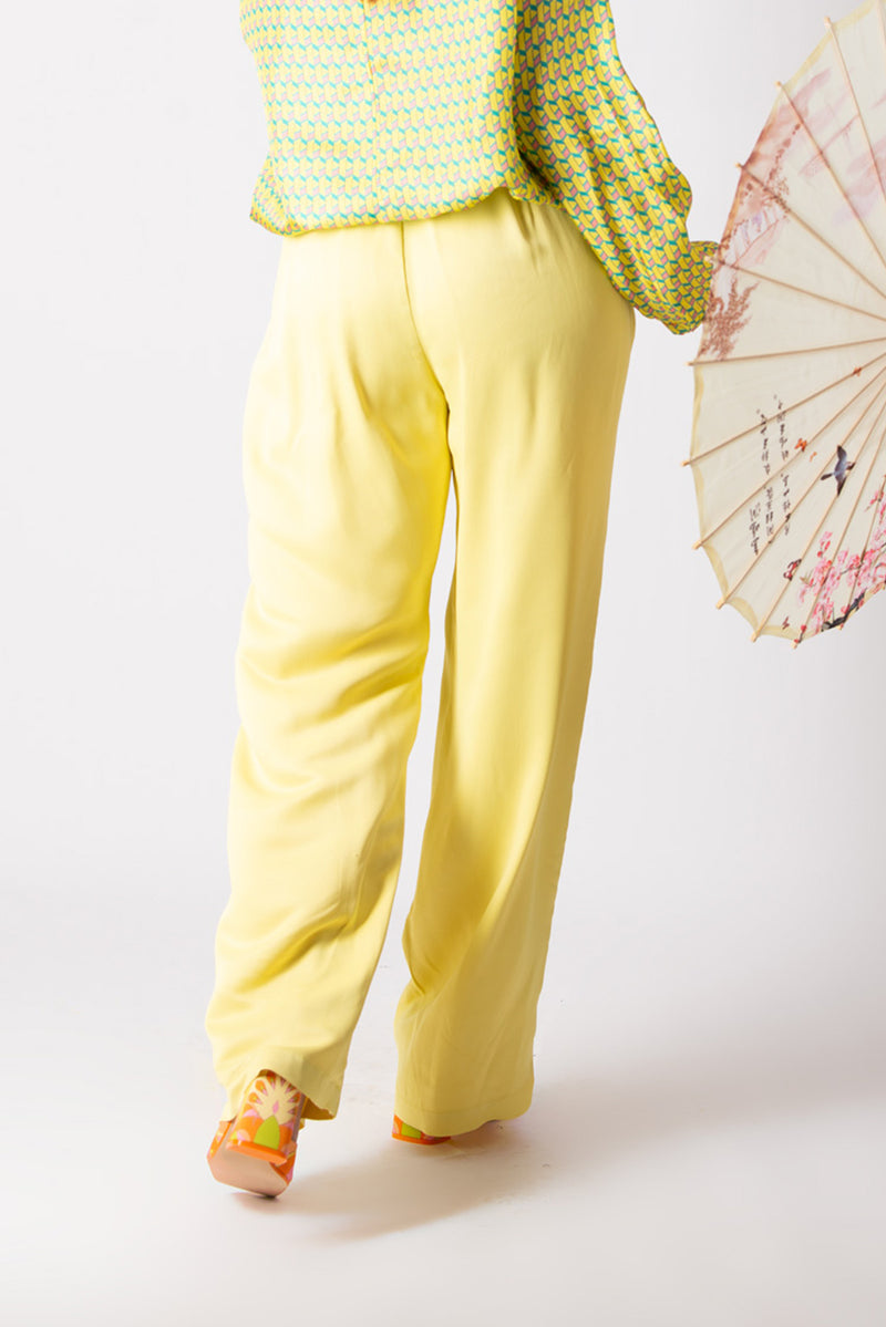 Model wearing SIERA Yellow Viscose Pants - DFold Clothing