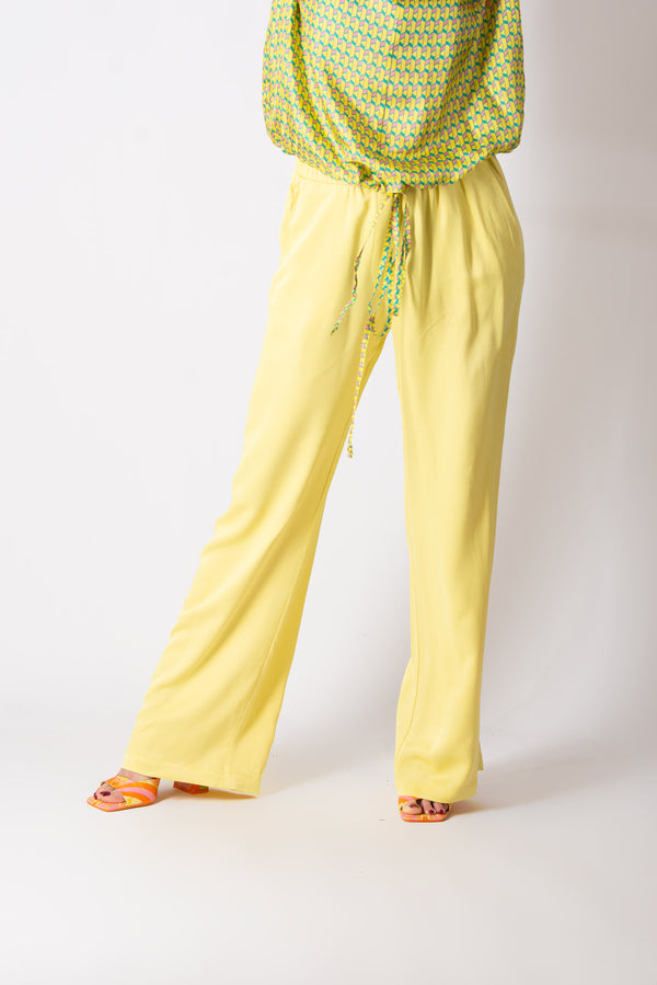 Model wearing SIERA Yellow Viscose Pants - DFold Clothing