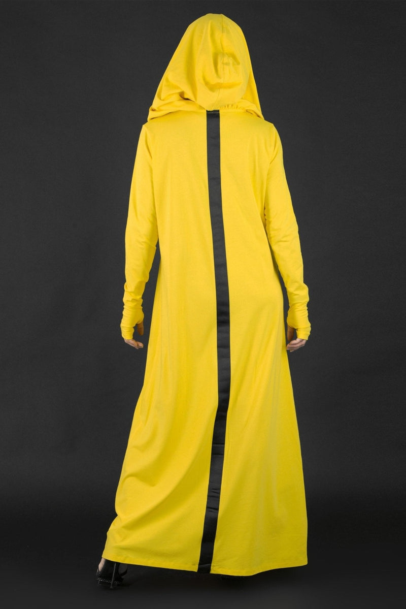 Back view of the REMY Long Hooded Dress in yellow with African woman print and hood.