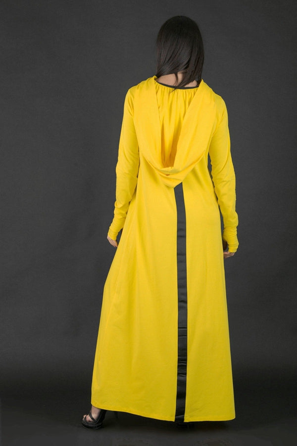 back view of the REMY Long Hooded Dress in yellow with African woman print and hood.