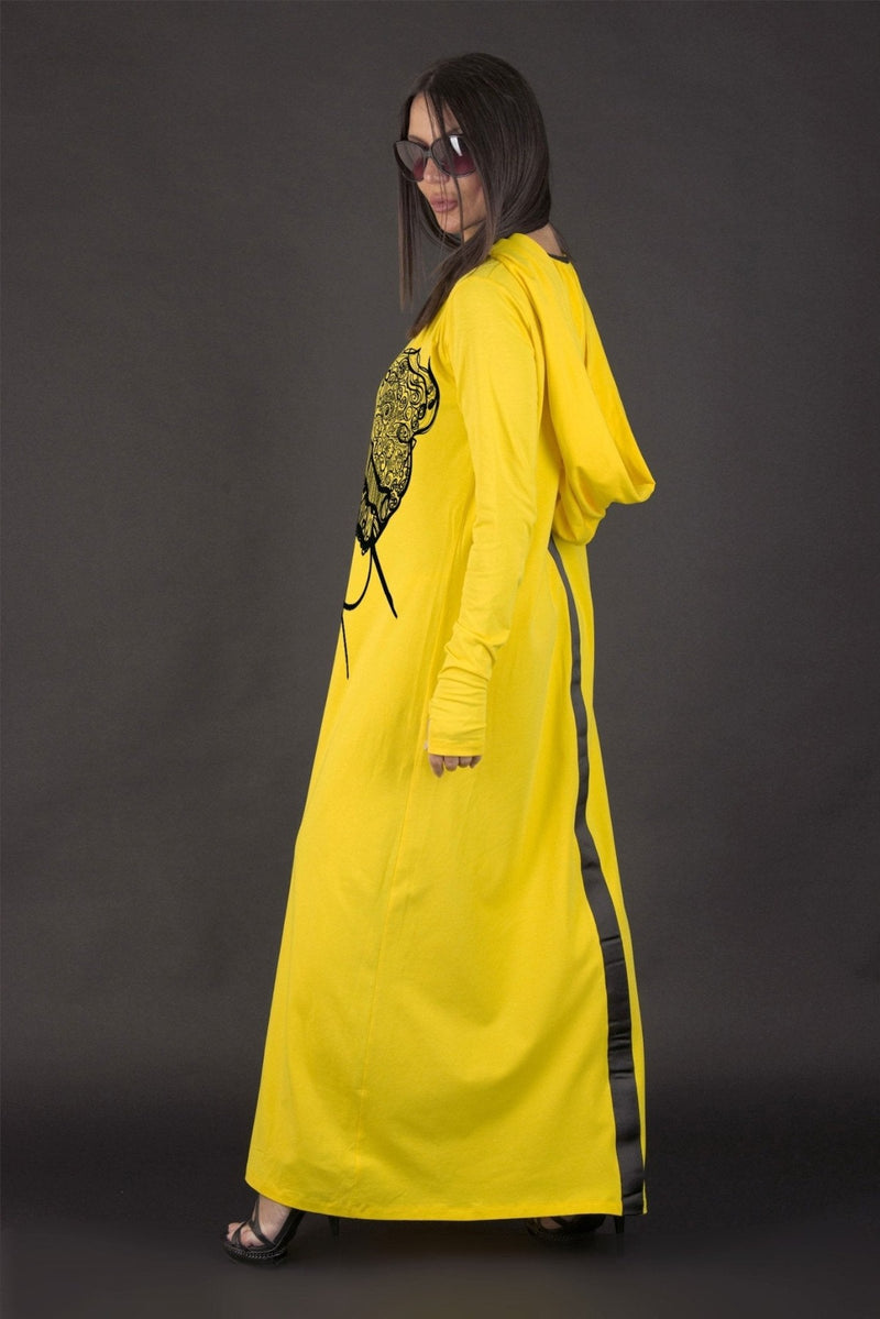 Side view of the REMY Long Hooded Dress with two side pockets.