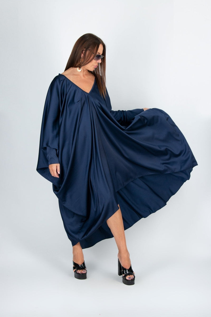 Model wearing DFold Clothing PREA Long Maxi Kaftan Dress in  Dark Blue