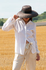 Close-up view of the fashion back detail with stripes on the JENNA Linen Shirt.