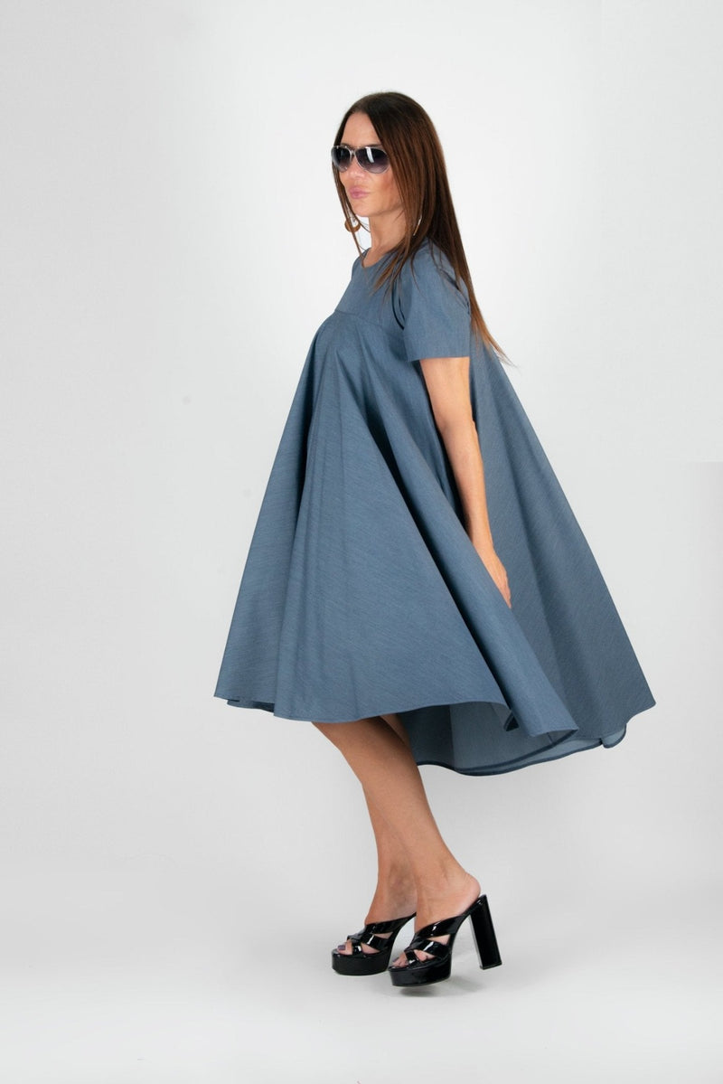 Side view of the dress, displaying the stylish design and perfect fit.