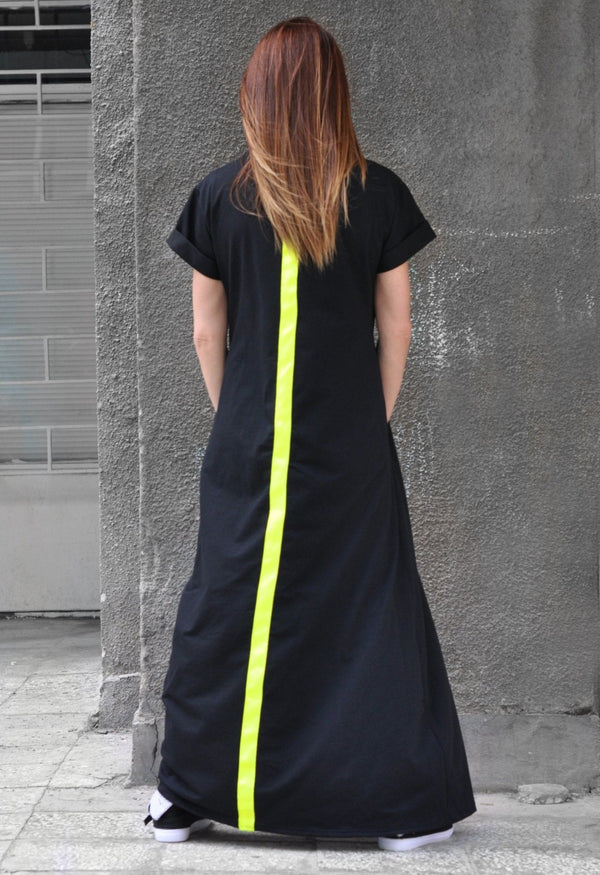 Model wearing DFold Clothing AMIRA Long Summer Dress With Back Stripe in Black, back view