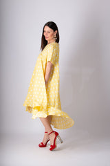 Image of the KOSARA Yellow Polka Dot Summer Maxi Dress featuring a vibrant yellow polka dot pattern.