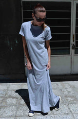 Model wearing DFold Clothing AMIRA Long Summer Dress With Back Stripe in Light Gray, front view.